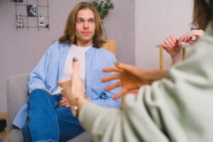 man talking with therapist